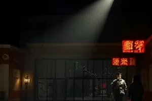 《半张底片》封面，暗房红灯下一张底片被夹在晾绳上